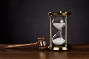 Wrongful Death Lawyer Hackensack, NJ - Gavel and Hourglass on dark